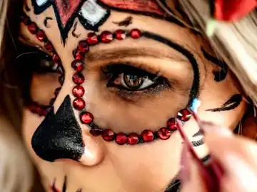 Face painter at a party