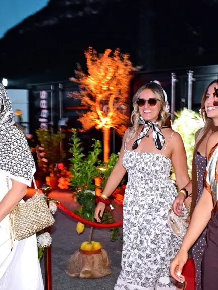 Guests photographed at a brand event