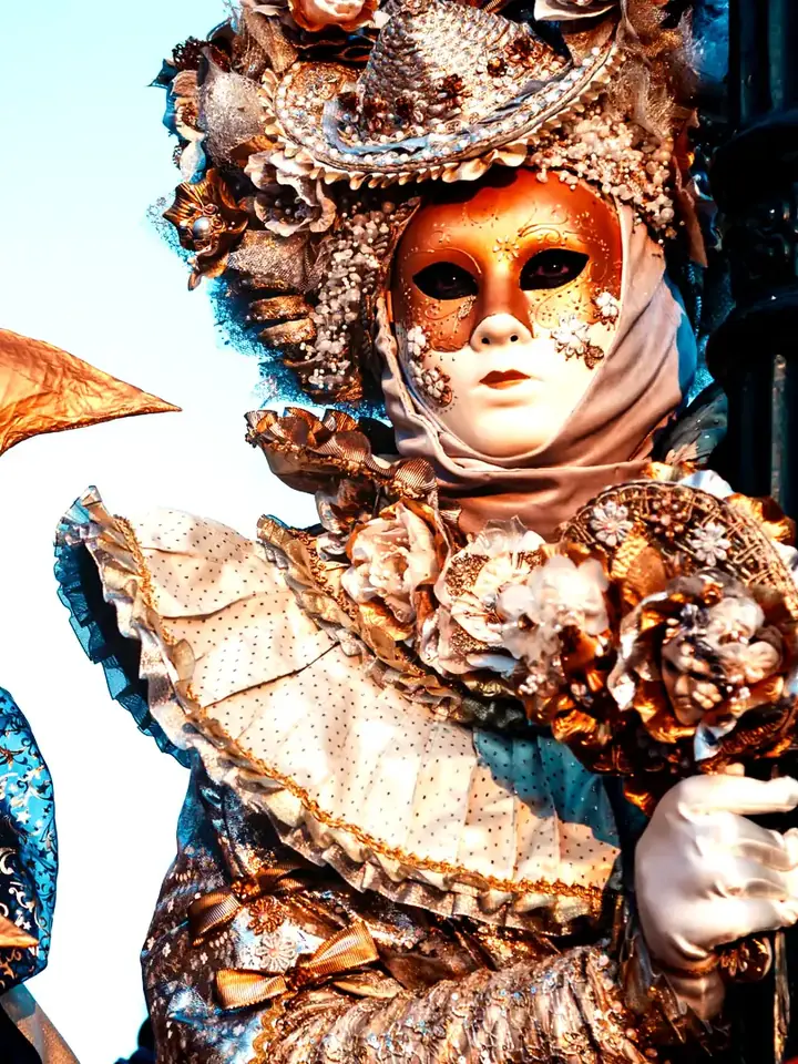 Carnival costumes with masks at an event