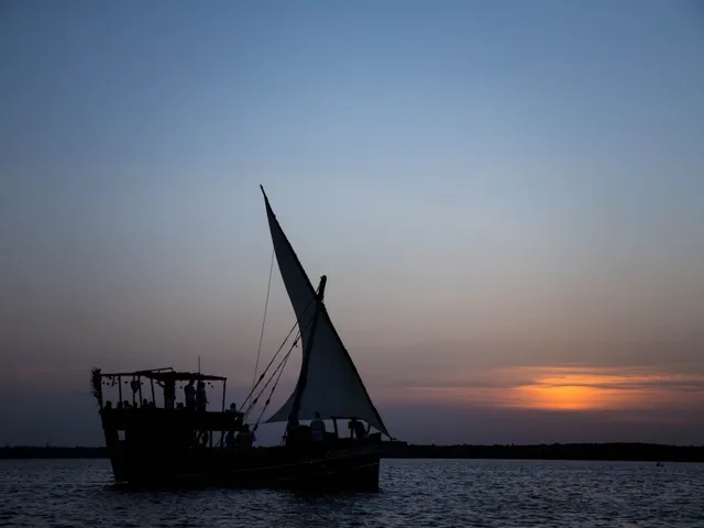 Traditional dhow at sunset
