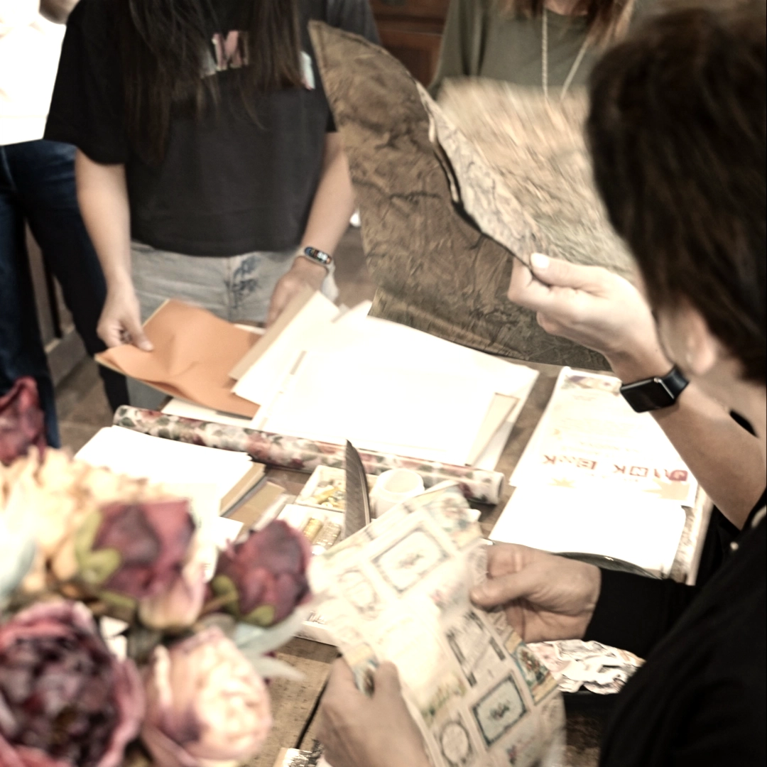 Goup of female at a workshop doing creative work with paper and recycled material in northern Italy Busto Arsizio 