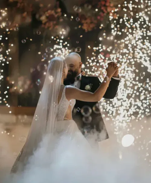 Wedding party dubai couple first dance with bubbles and fountains