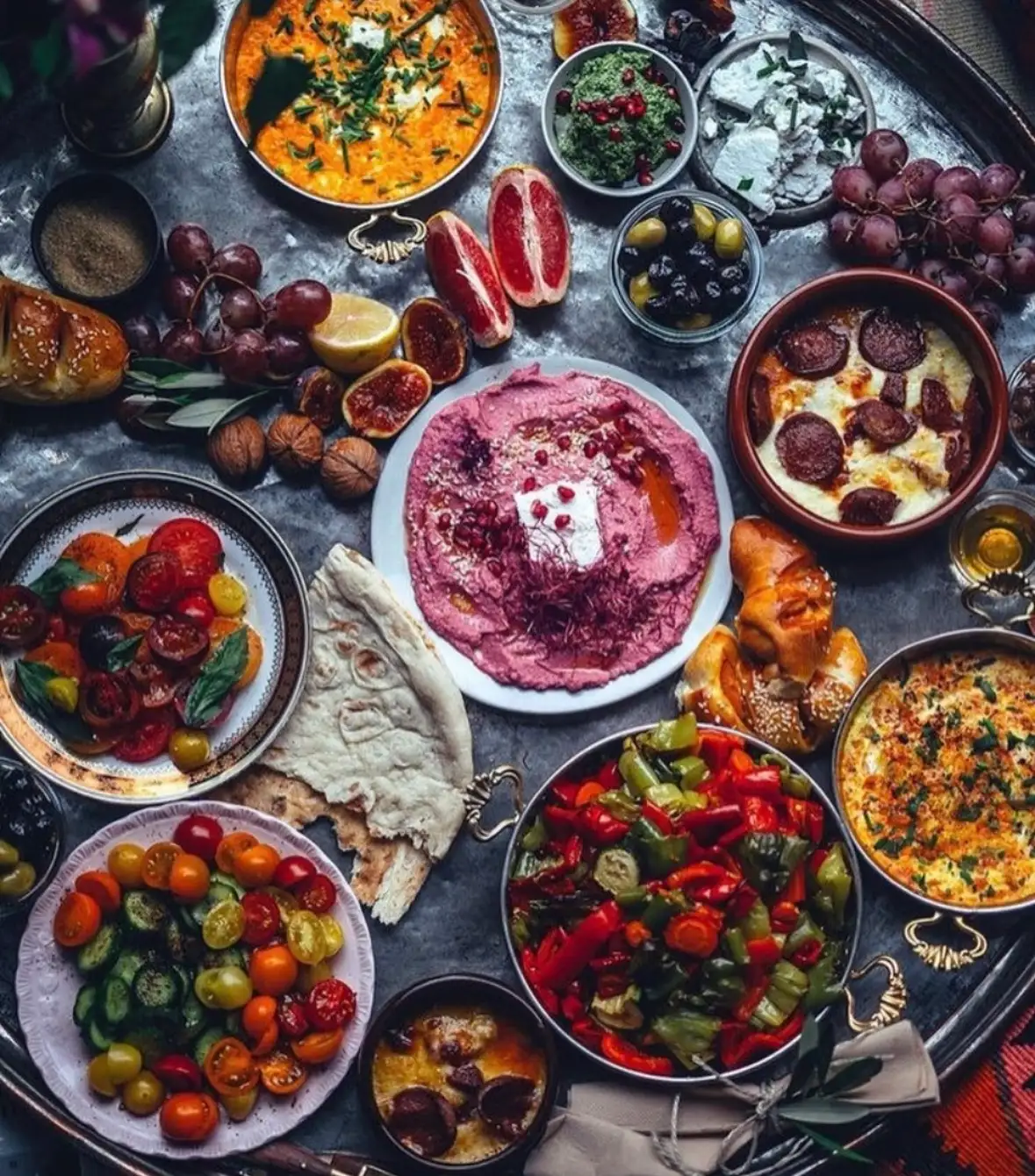 Shared mezze table at a Dubai restaurant, photographed by Cover Page Agency