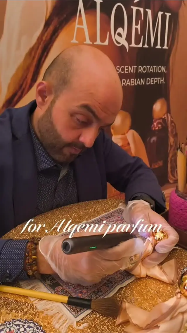 Cover Page Agency on Instagram: Live Arabic Calligraphy Engraving on ALQÉMI Perfume Bottles at the Douglas Christmas House Event.