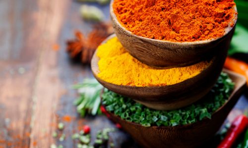 Many herbs and spices are safe and beneficial for dogs in small, moderated amounts, providing antioxidants and aiding digestion.