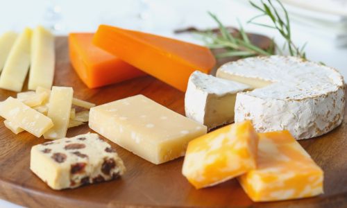 Dogs can have small amounts of dairy, but many are lactose intolerant, which can cause vomiting, diarrhoea, and abdominal pain.