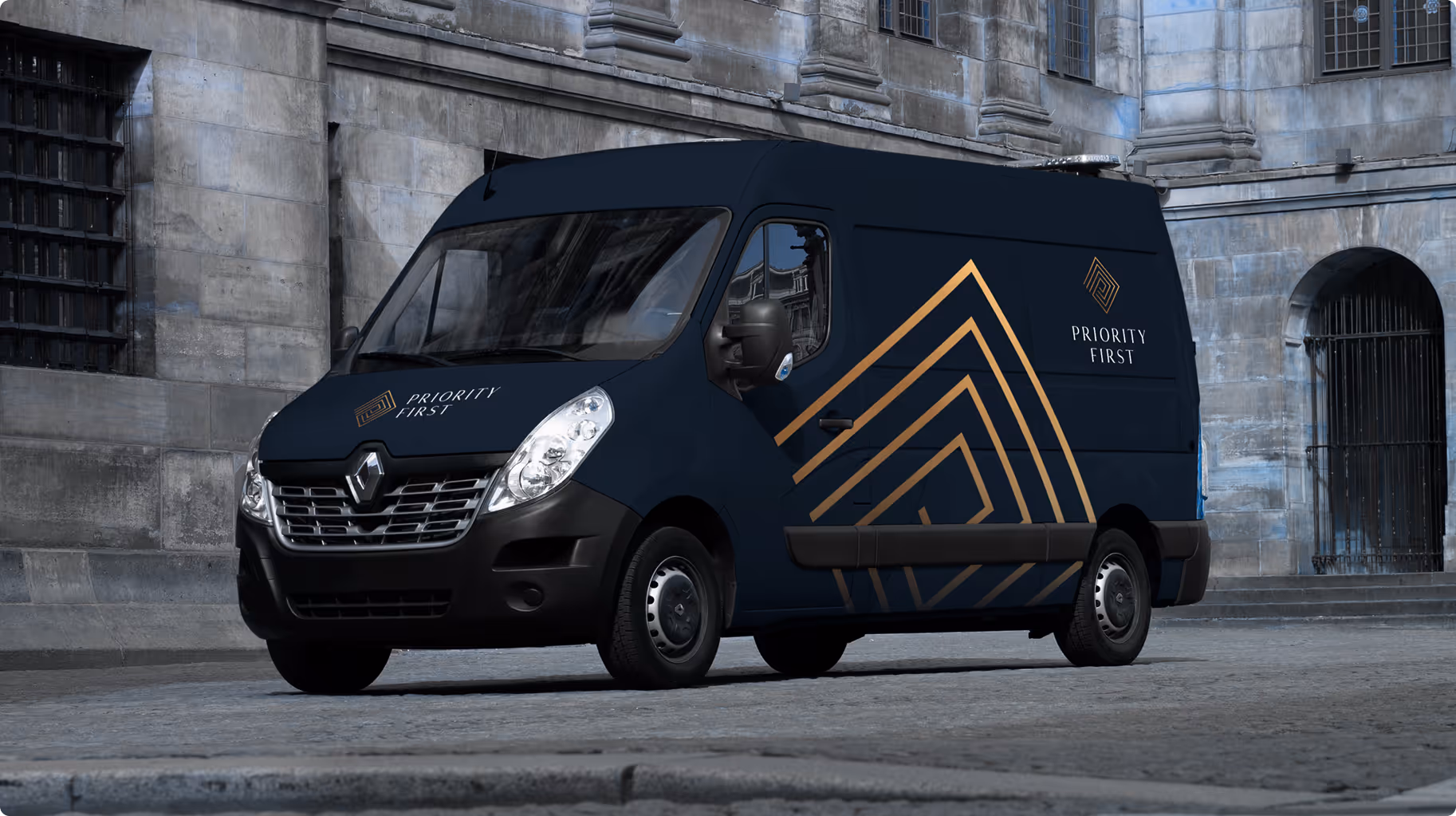 Dark blue delivery van with gold geometric design and ‘Priority First’ text parked on cobblestone street.