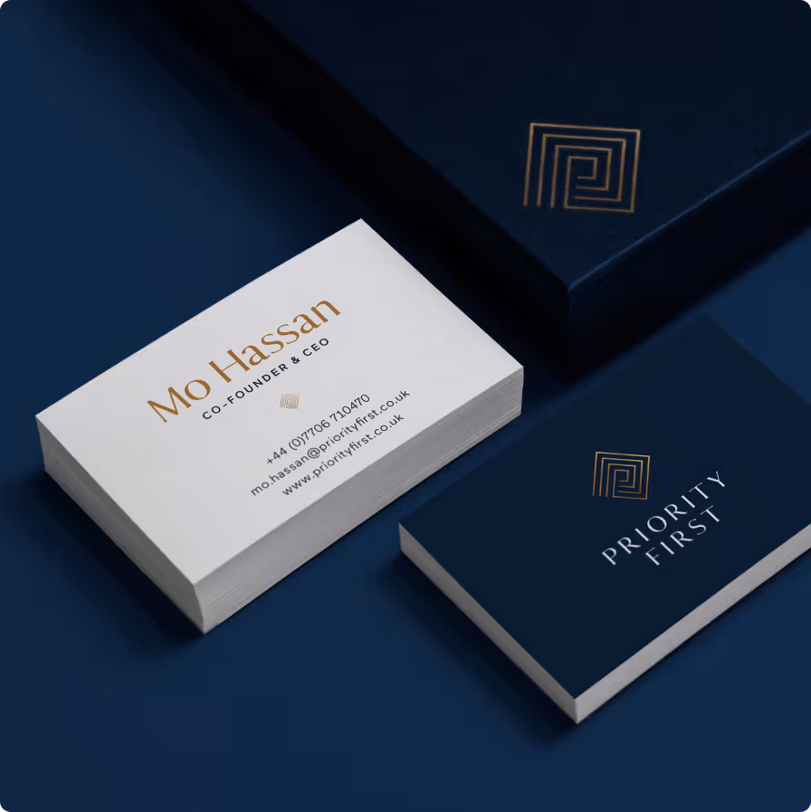 Mo Hassan Co-Founder & CEO business cards with navy blue Priority First branding and gold logo.