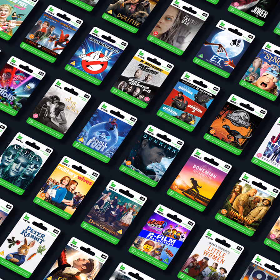 Multiple movie rental cards with titles like Ghostbusters, E.T., Dunkirk, and Jurassic World on a black background.