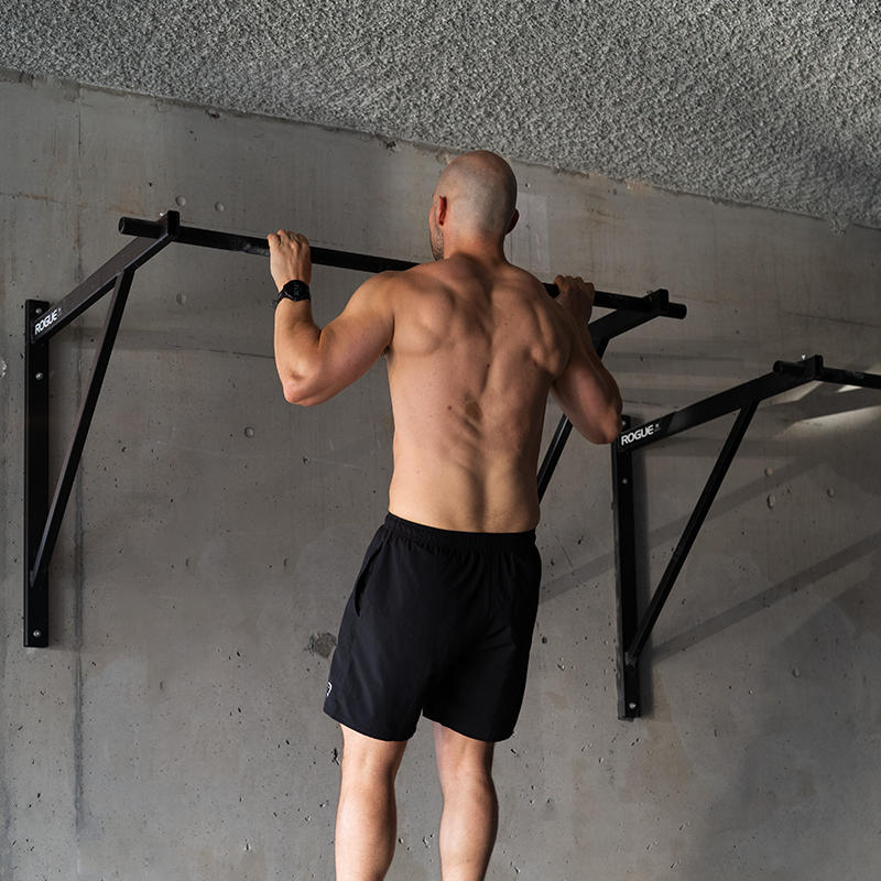 Pull-up bars and strength training area at Convoy Gym