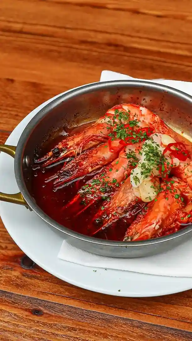 Everyone's favourite 🦐 

Pil pil tiger prawns • roasted garlic • red chilli oil

Head to the link in our bio to book your table.