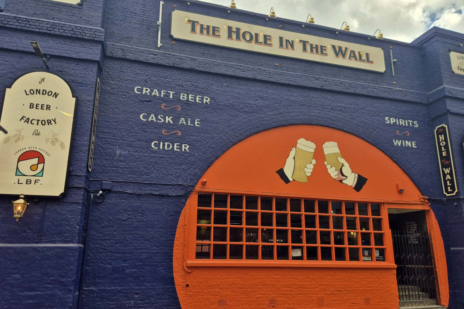 The Hole in the Wall is a welcoming neighbourhood pub serving a carefully curated selection of London Beer Factory beers alongside guest pours and classic favourites. Combining the feel of a traditional local with a modern craft beer offering, it’s a place to drop in for a relaxed pint, meet friends, or discover something new on tap. With a laid-back atmosphere and a focus on quality drinks, The Hole in the Wall brings together great beer and good company in a setting that feels both familiar and distinctly London.
