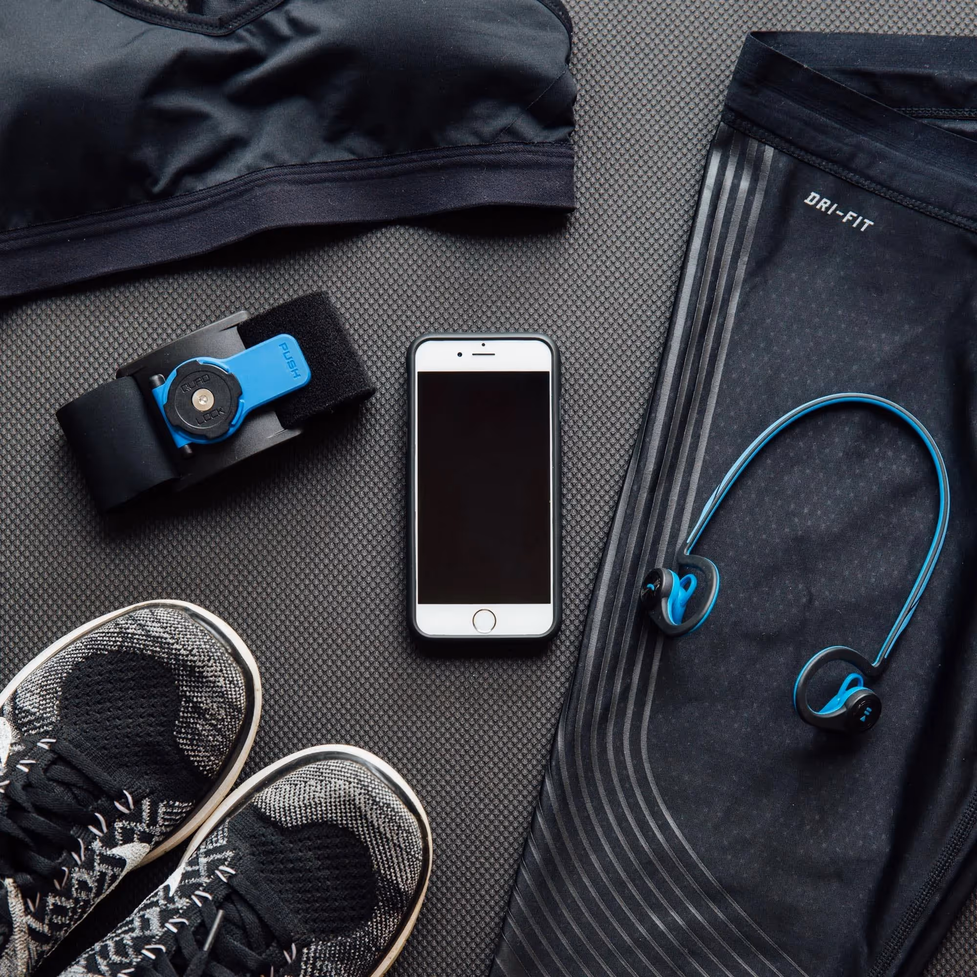 Quad Lock product page showing device compatibility selector on Shopify Plus