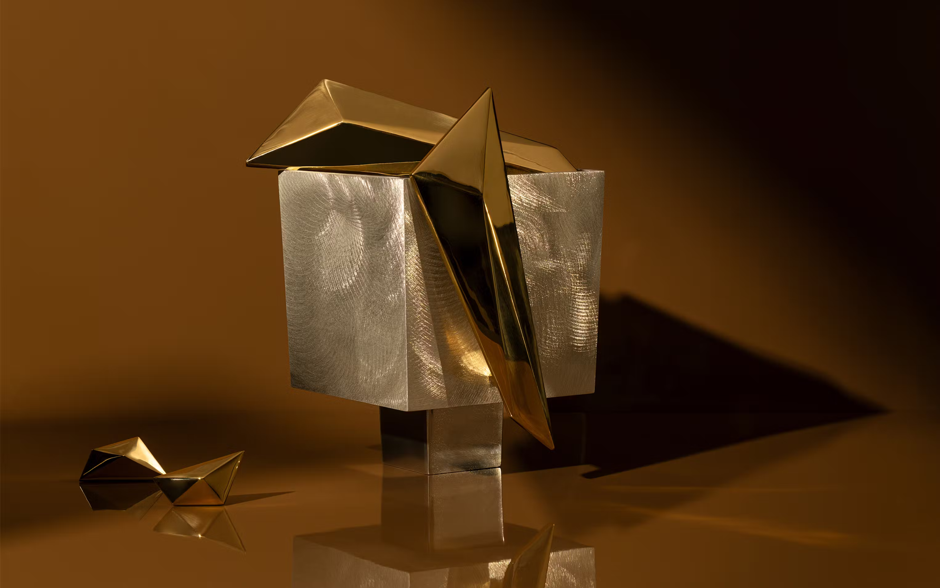 Lo & Co brass door hardware collection displayed on styled interior surface