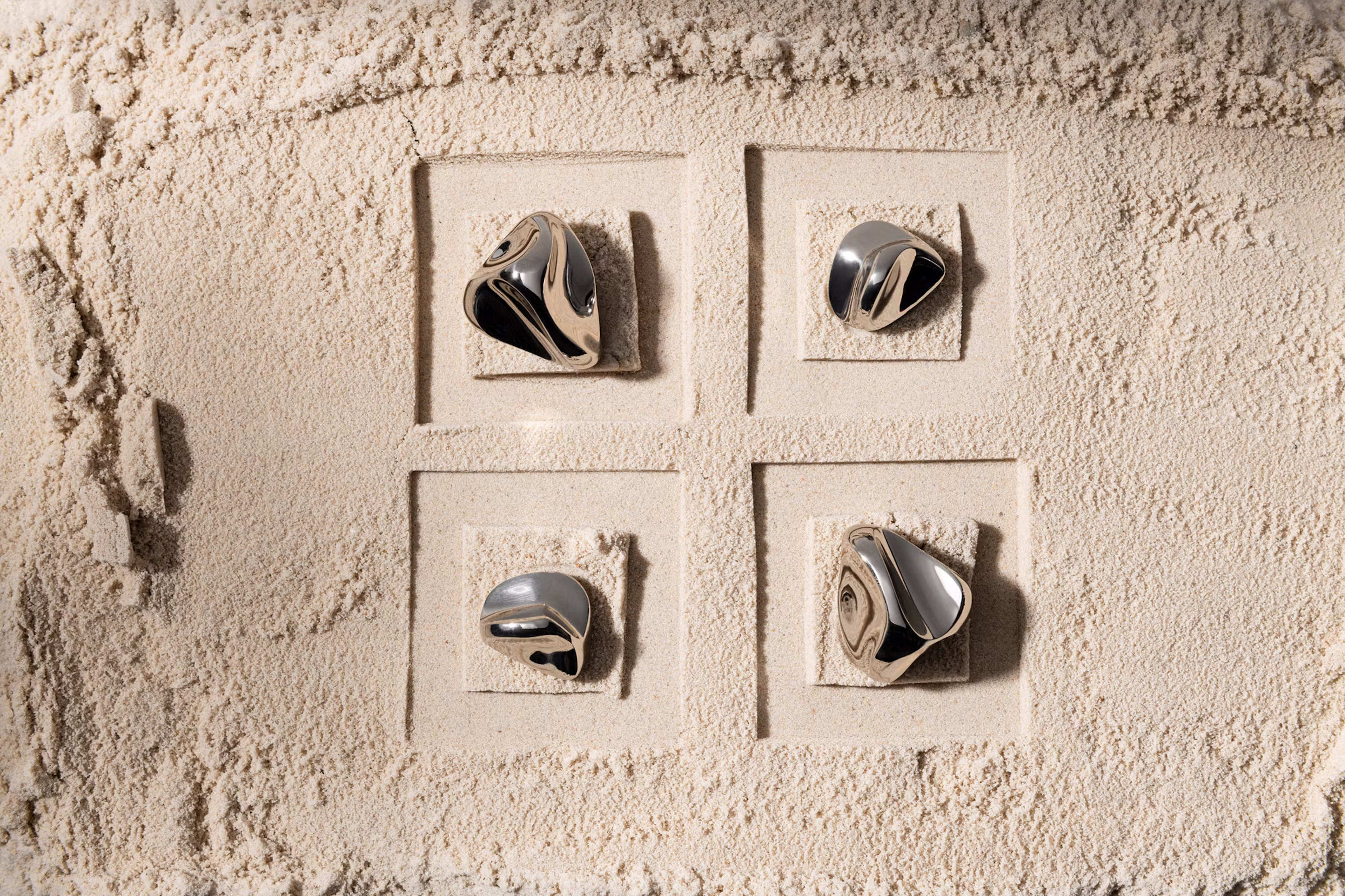 Lo & Co sand-toned hardware close-up showing artisan brass finish detail