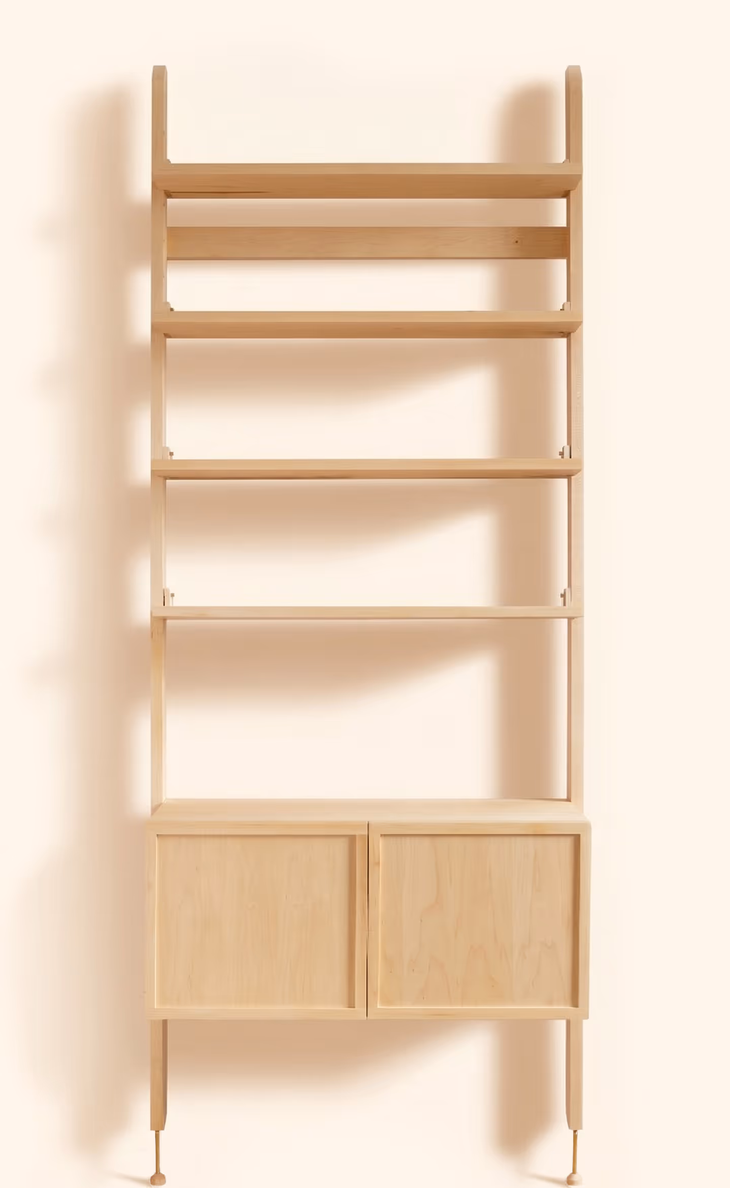 Photograph of an example Forma single-bay setup, with a closed small cabinet and shelves