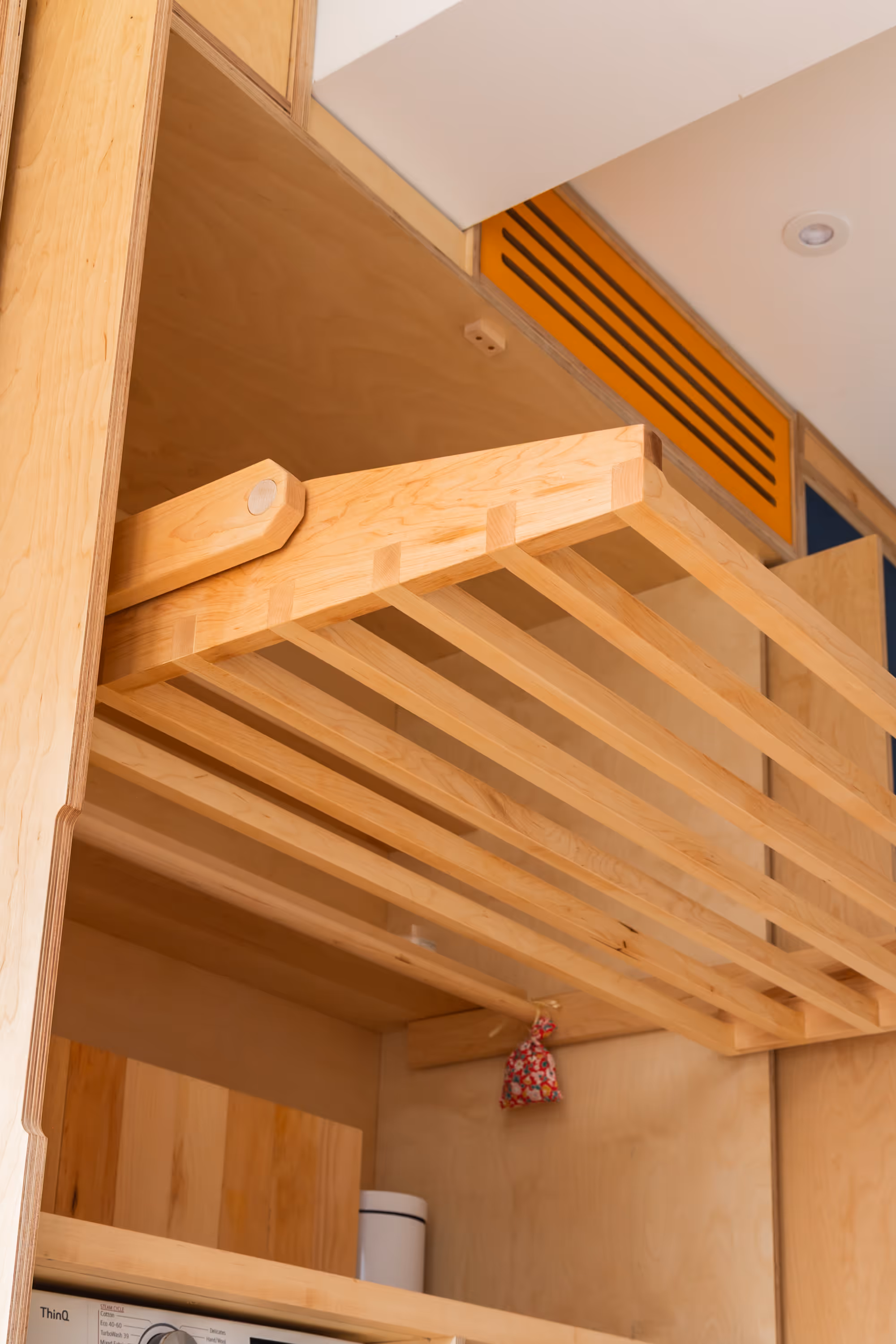 An in-built, folding-out laundry rack