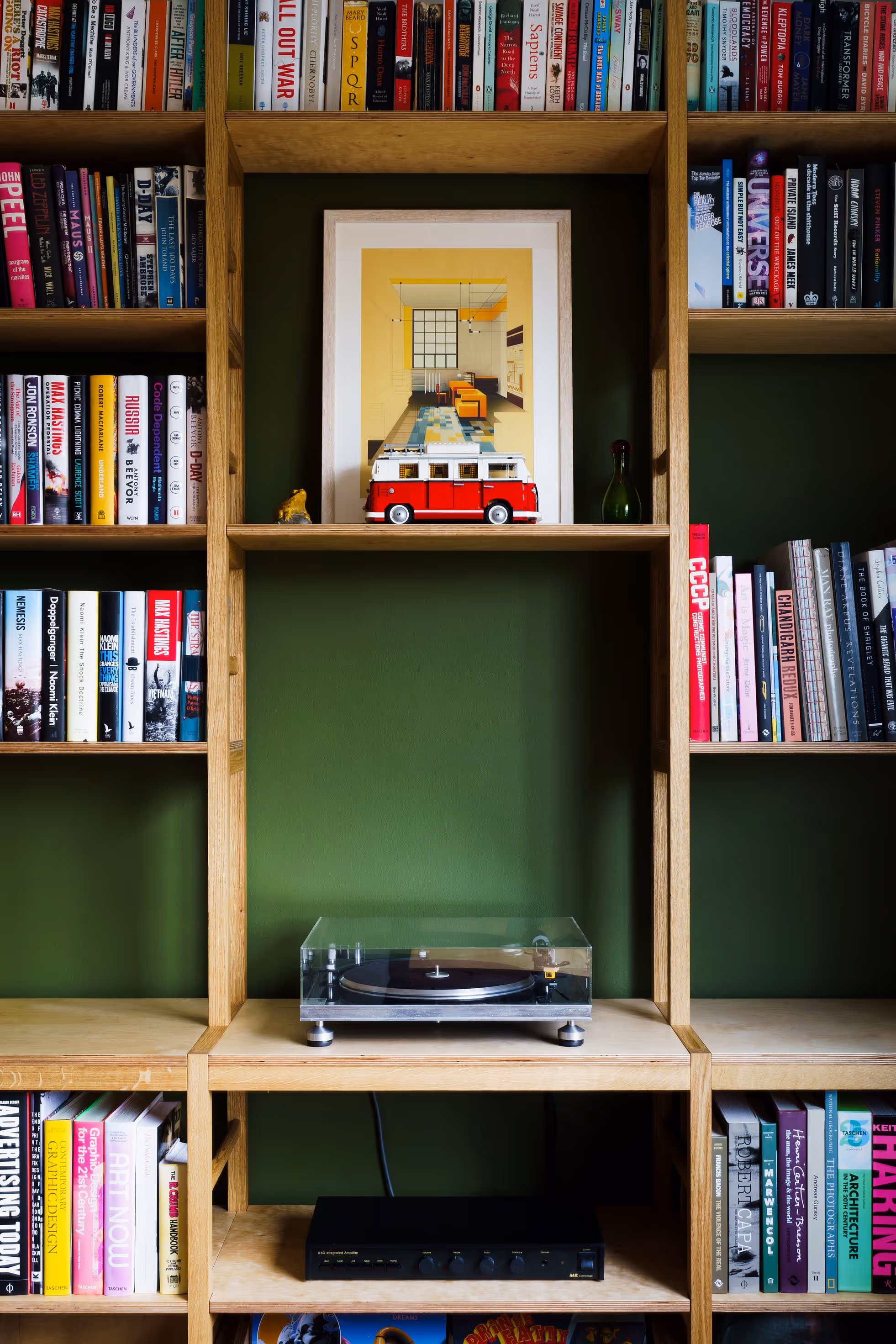 A bespoke storage unit by Bruntsfield Designs, with books and a record player.