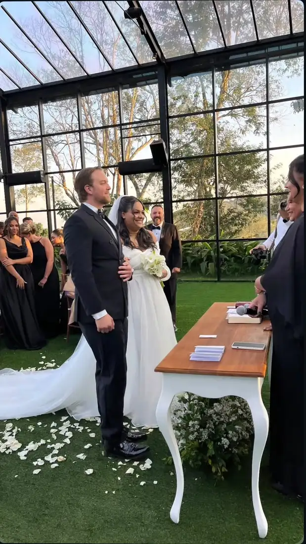 Bilingual English and Portuguese wedding translator providing professional interpretation during a wedding ceremony and celebration.