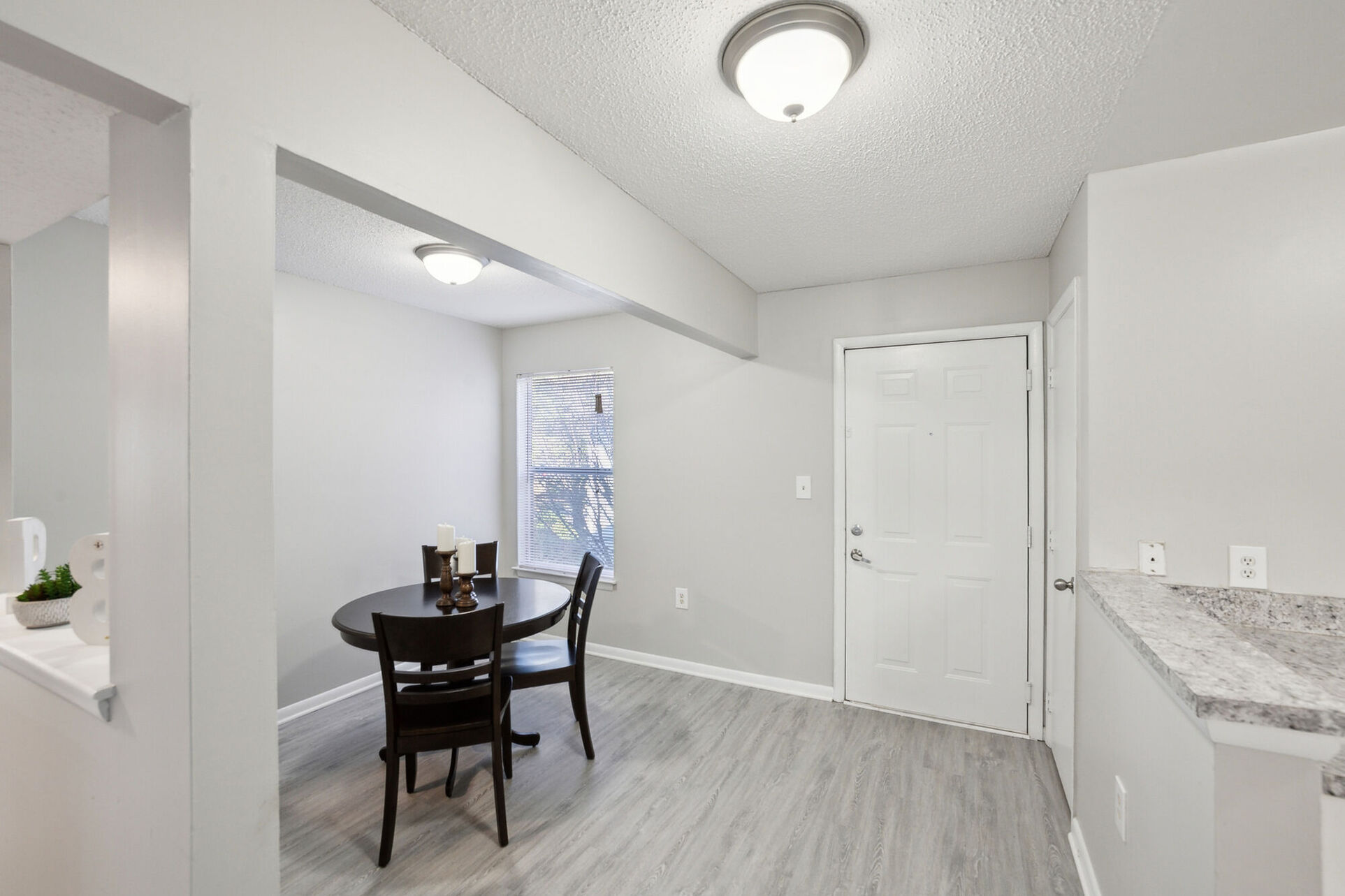 Dinning room with table and black chairs