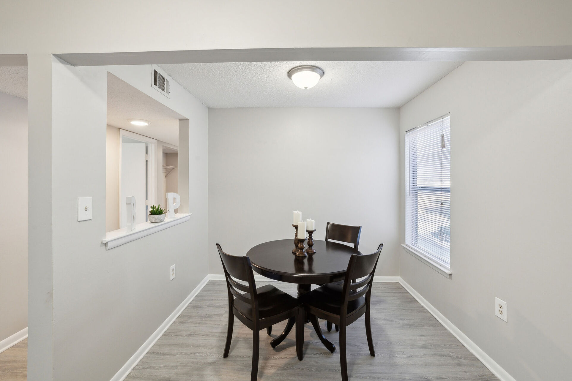 Dinning room with table and black chairs