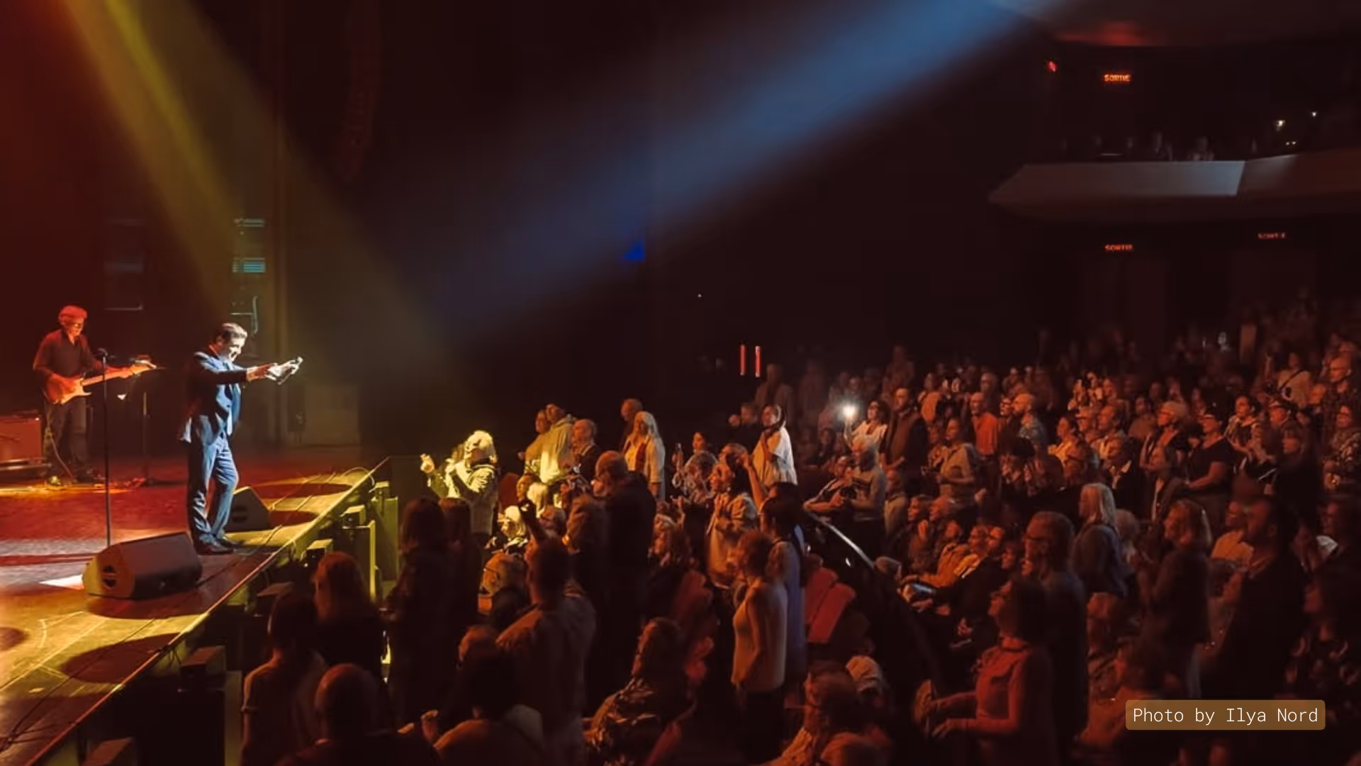 Julien Dassin performing on stage
