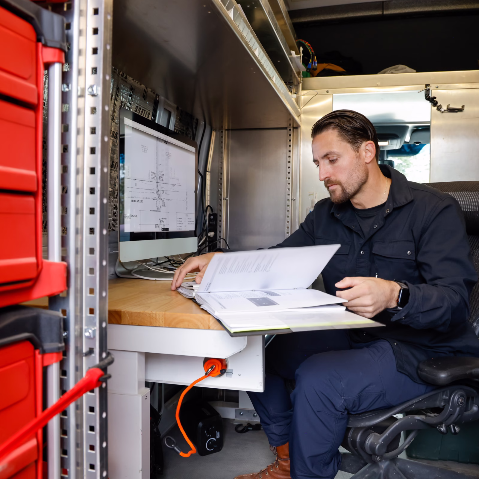 5pillars-chris looking at document