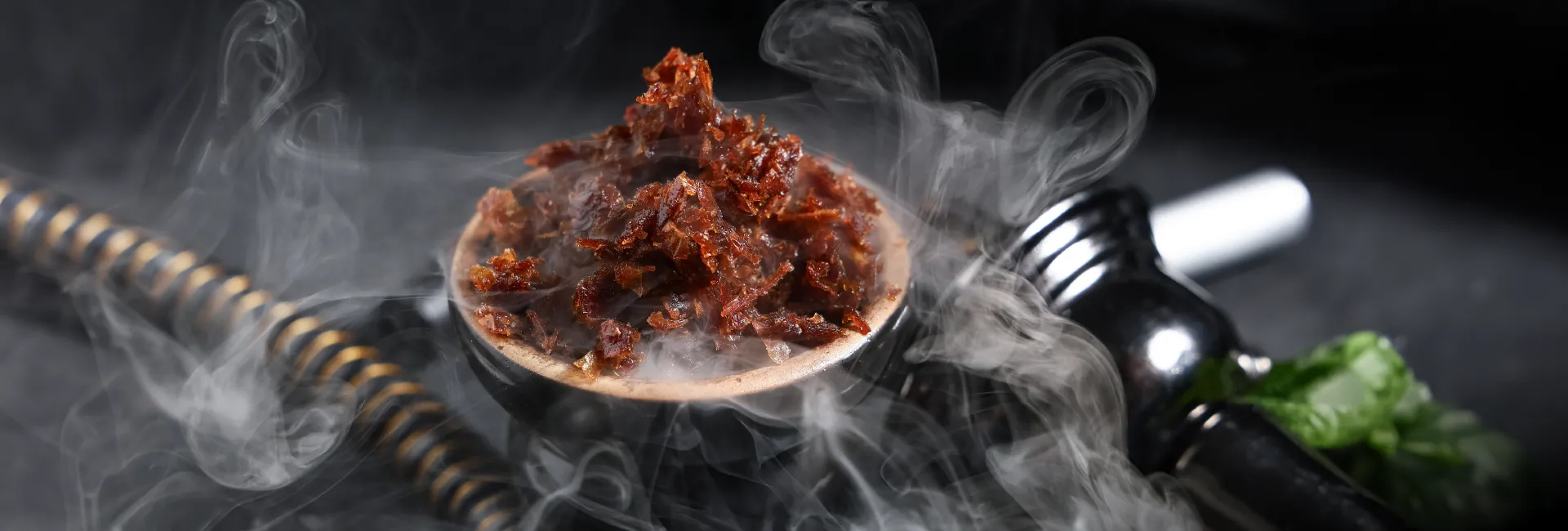 A bowl filled with food sitting on top of a stove.