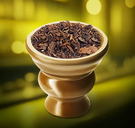 A wooden bowl filled with a brown substance.
