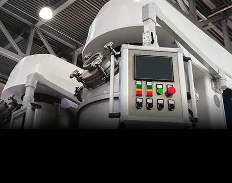 A large white machine in a building.