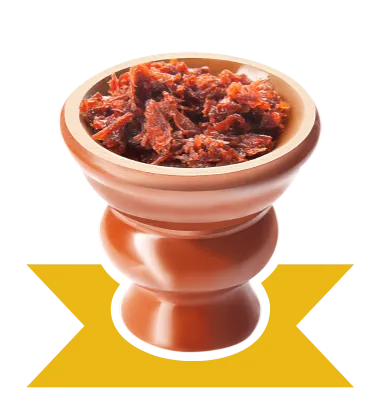 A bowl of food sitting on top of a wooden stand.