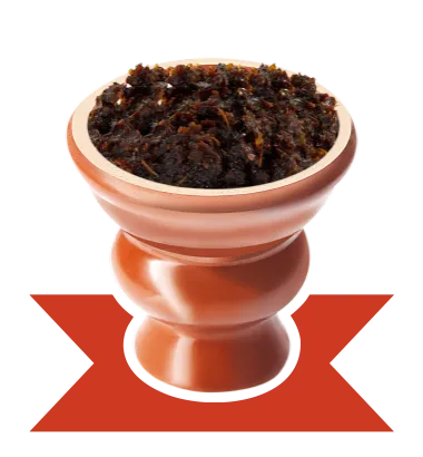 A bowl filled with food sitting on top of a table.