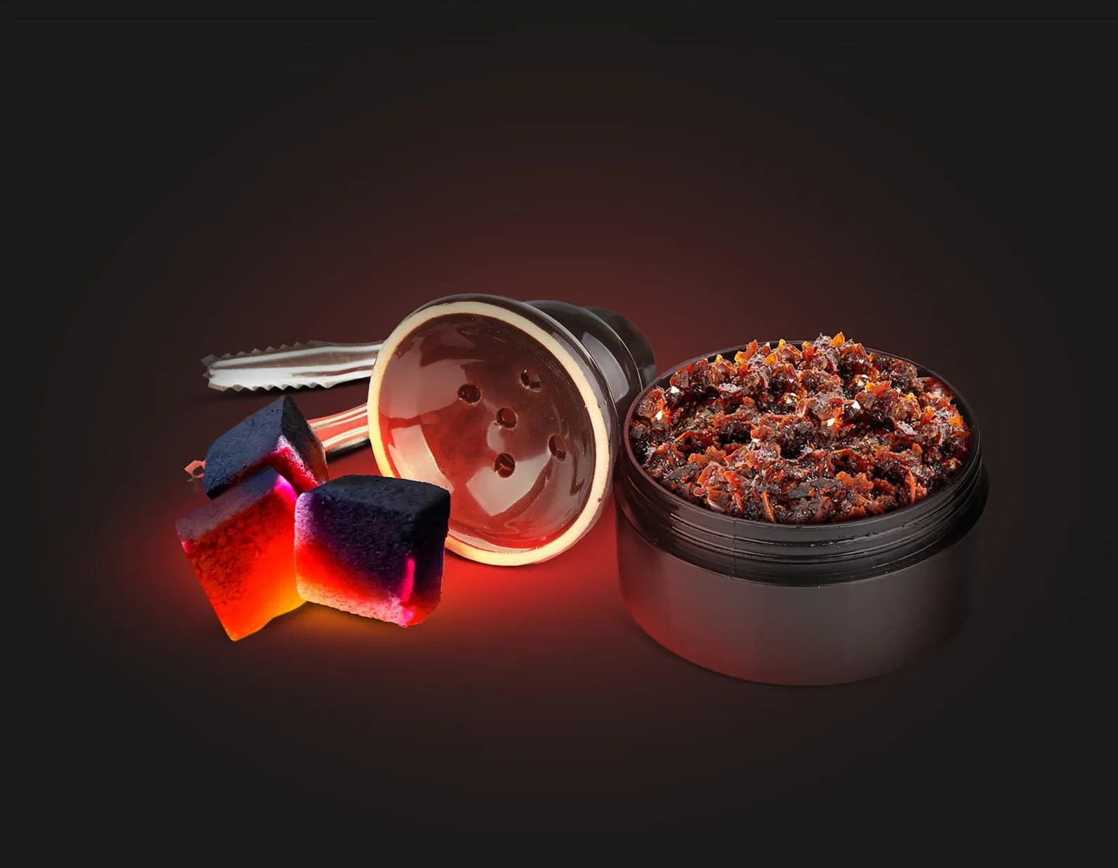 A couple of pieces of candy sitting next to a container.