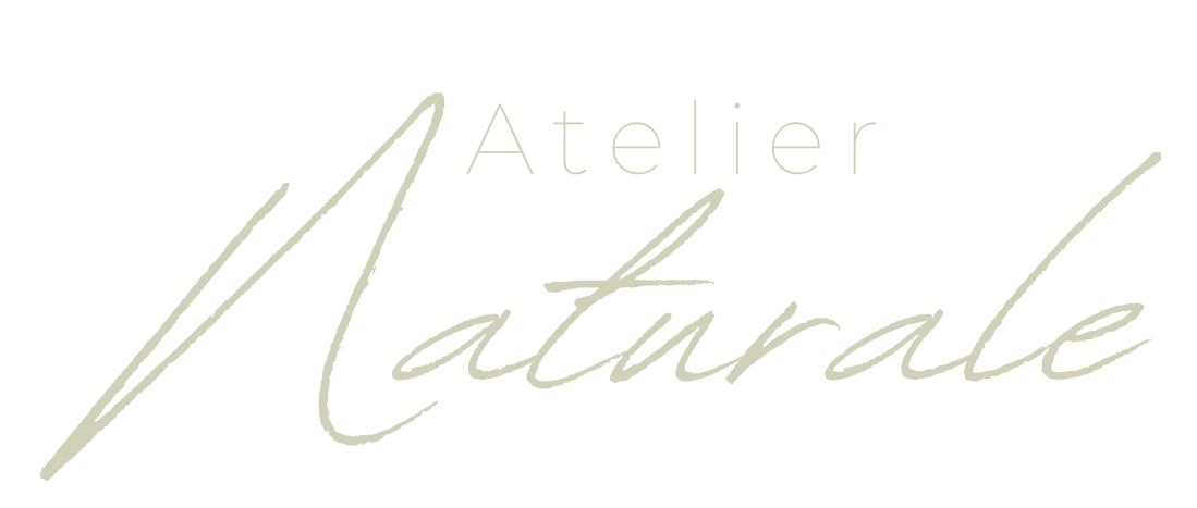 Atelier Naturale is written in a Fluid and elegant handwriting 