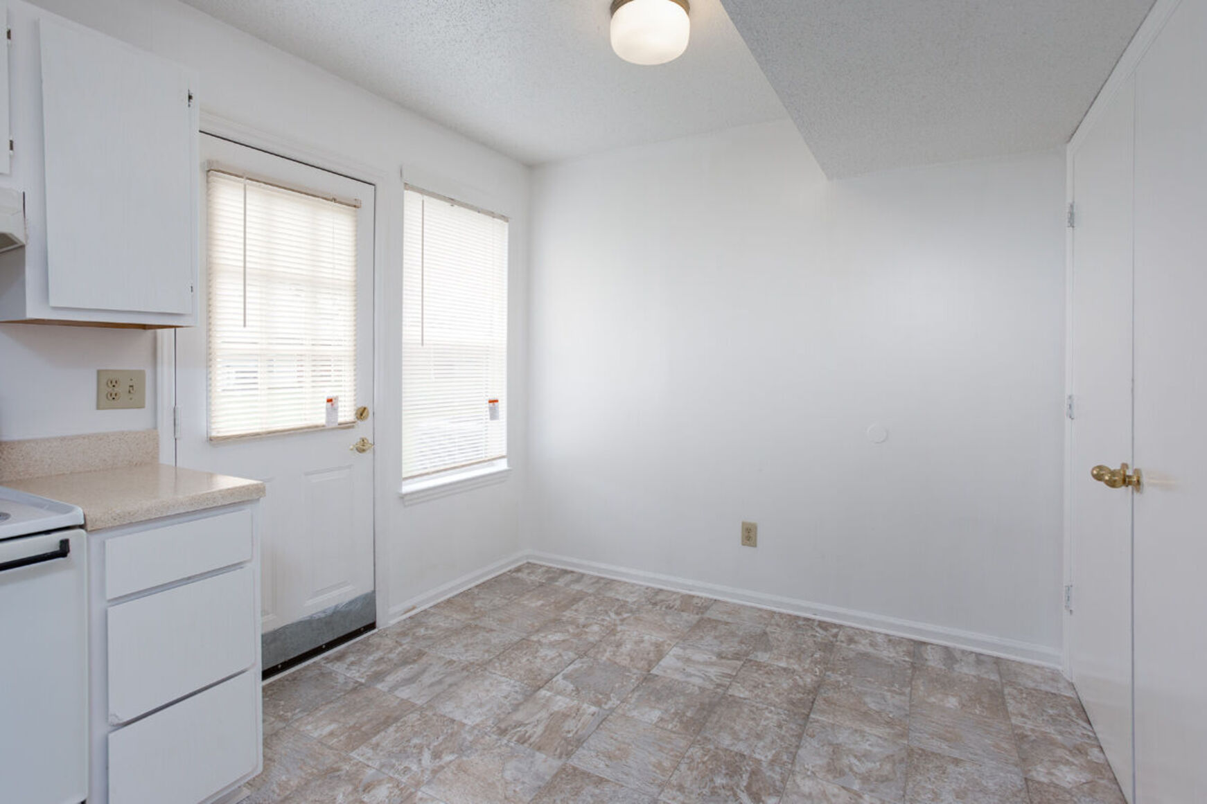 Kitchen with white cabinets