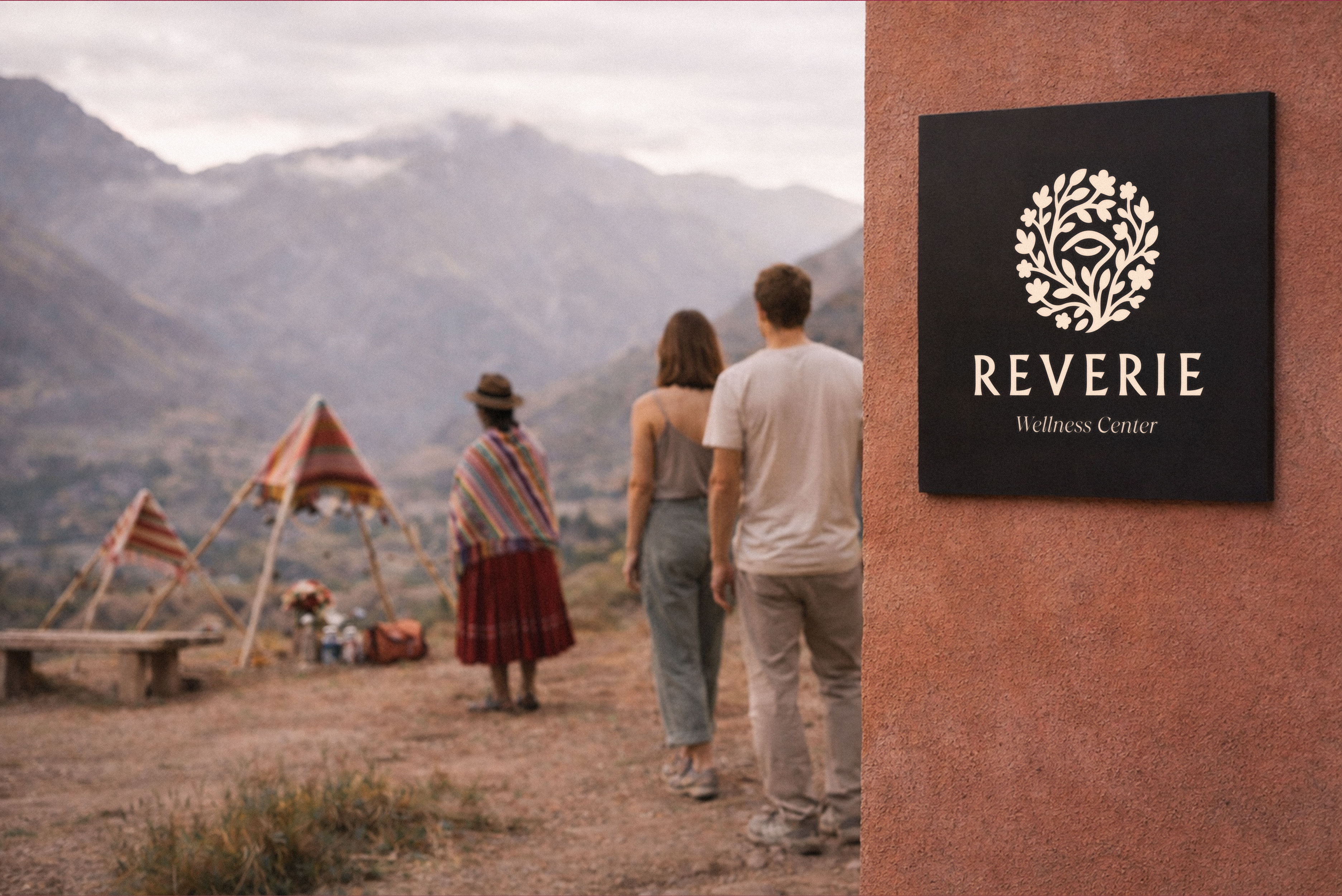 Reverie wellness brand identity – logo applied on signage in natural landscape setting