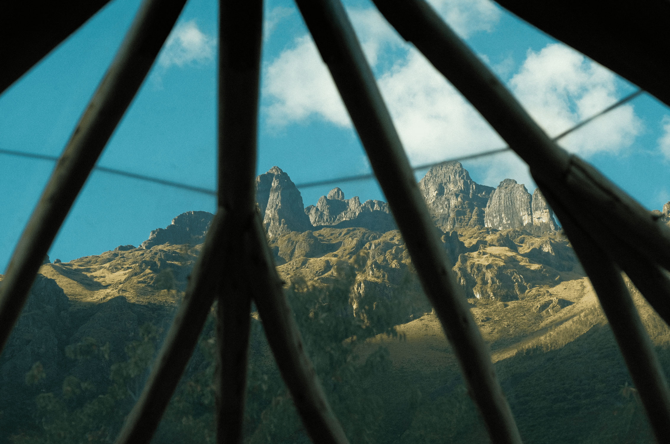 Mountain landscape view through architectural structure for Reverie wellness brand