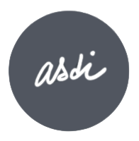 Dark gray circle with stylized black cursive text inside. Logo Assi