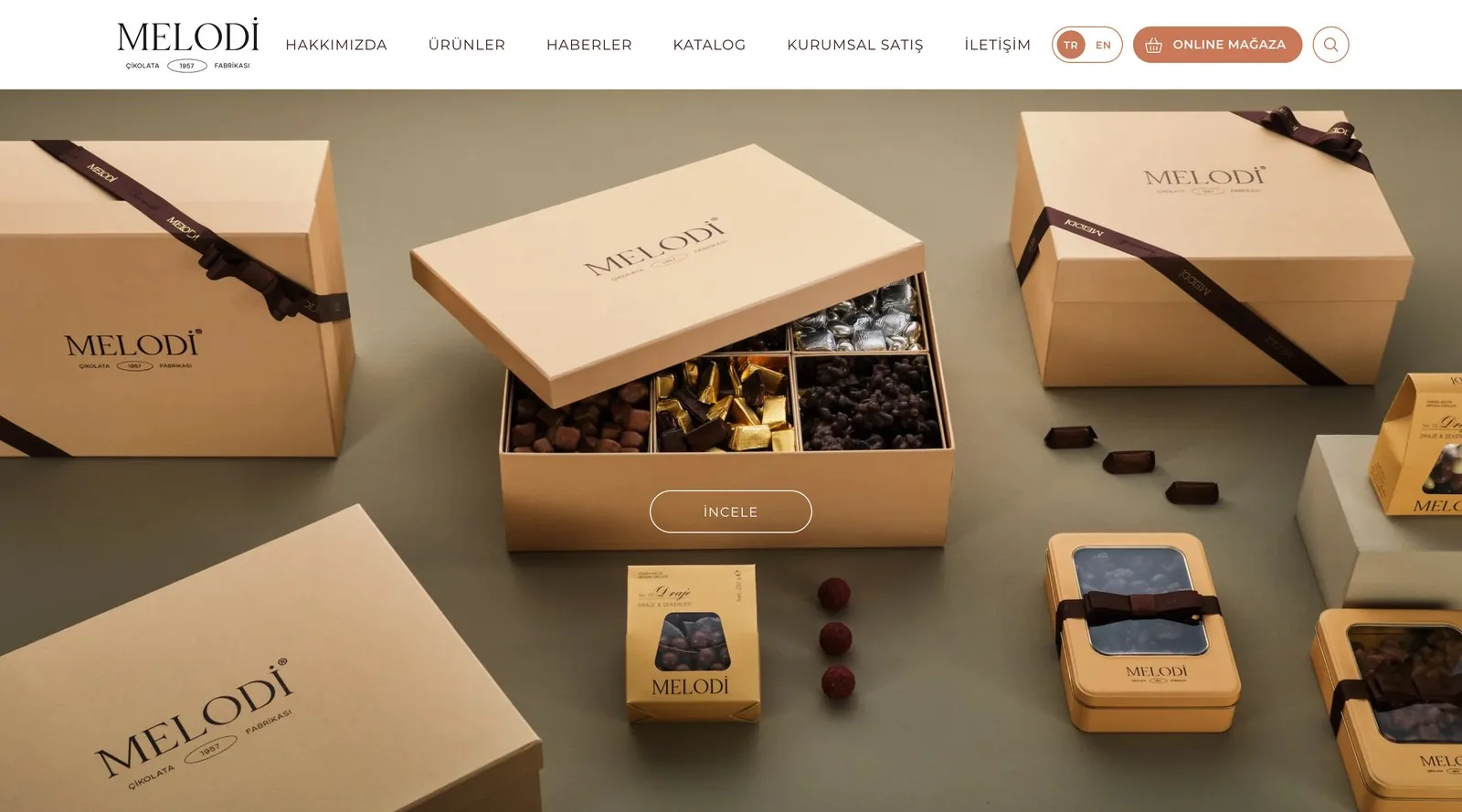 Melodi Çikolata's site on Shopify: About Us, Products, News, Catalog, Corporate Sales, and Contact in the menu, plus a separate Online Store button and a TR/EN language selector