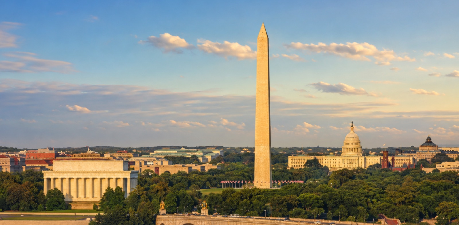 Washington DC skyline at golden hour with the Lincoln Memorial, Washington Monument, and U.S. Capitol