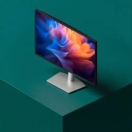 Slim computer monitor with vibrant abstract color display, mounted on a silver stand on dark green surface.