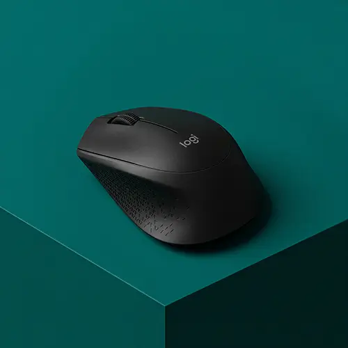 Sleek black wireless Logitech computer mouse on a dark teal surface.