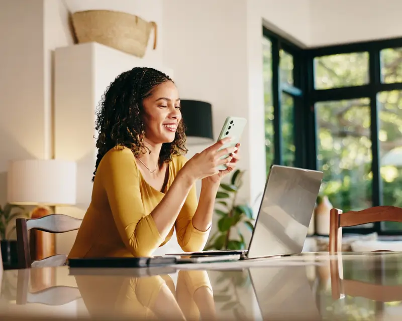 Remote professional reviewing documents while coordinating with US companies through Somewhere's platform