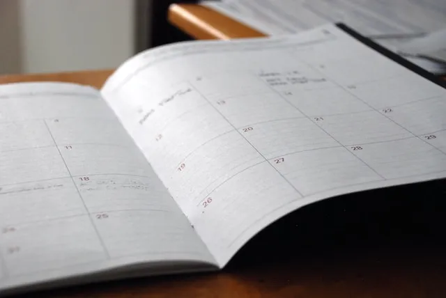 An open daily planner on a desk
