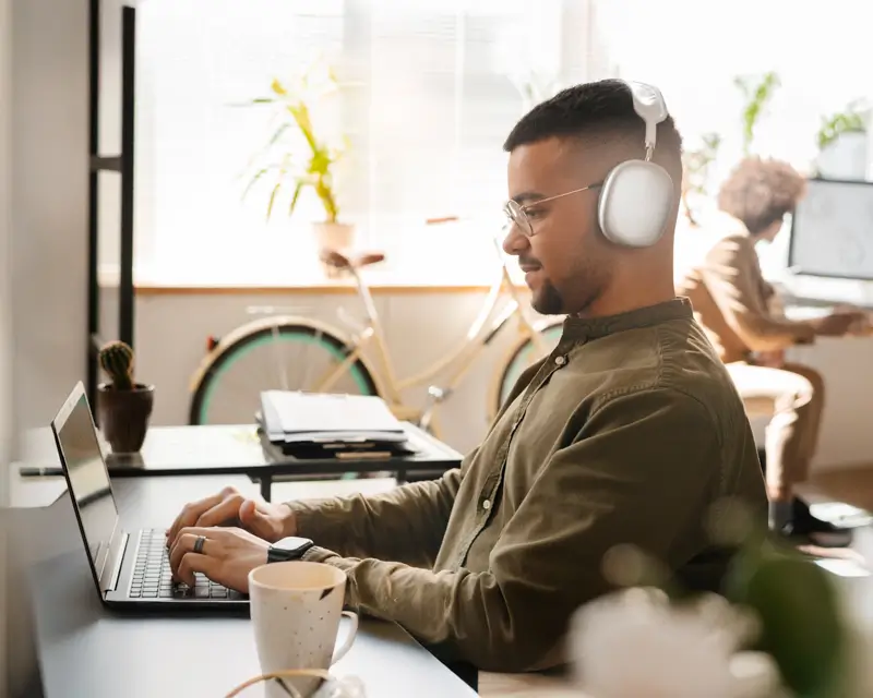 Remote developer working from modern office space showcasing Somewhere's global tech talent network