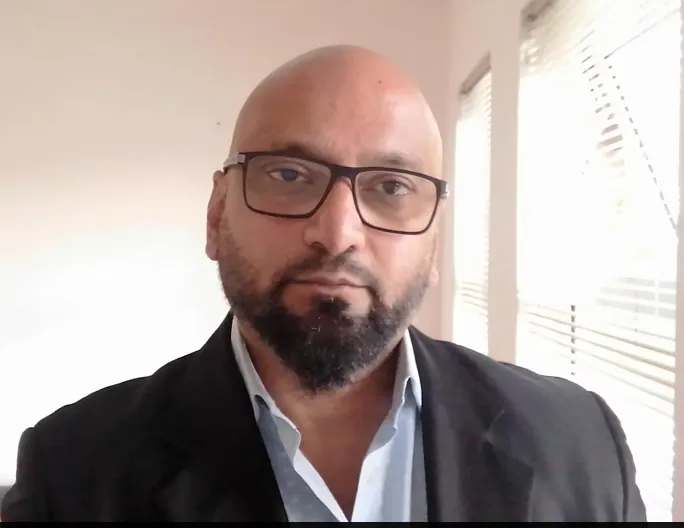 Portrait of Ravi, Director of Acquisition from South Africa