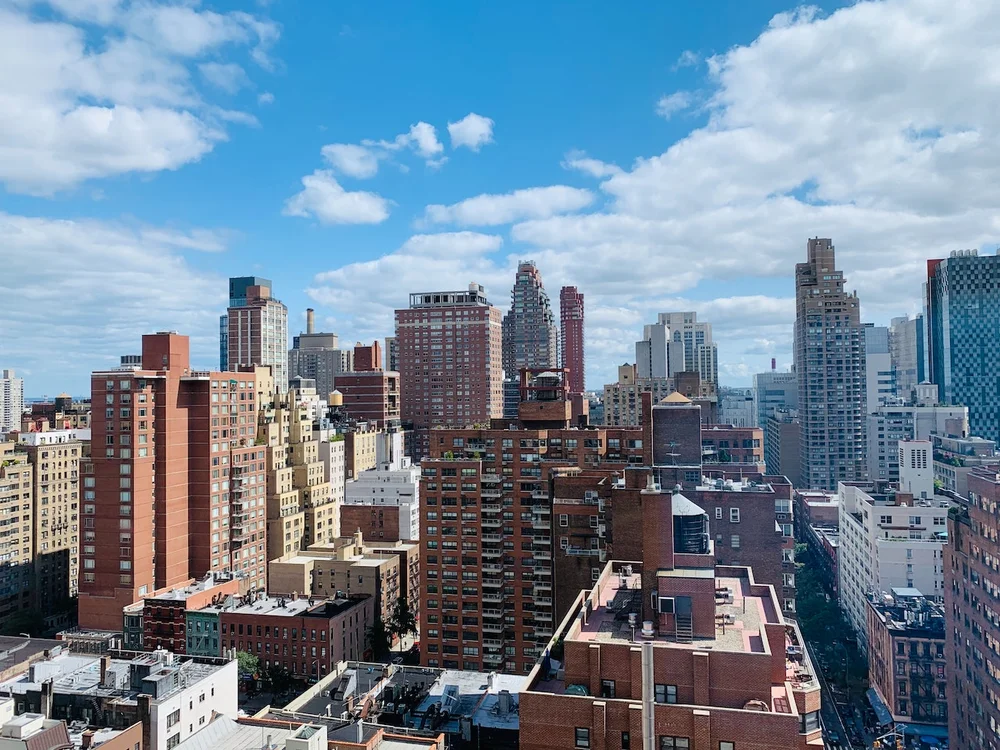 Buildings tower over an urban skyline