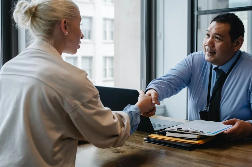 Two people shaking hands