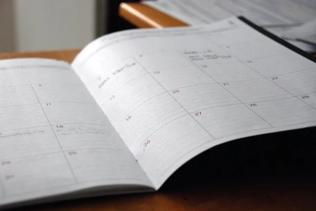 An open daily planner on a desk