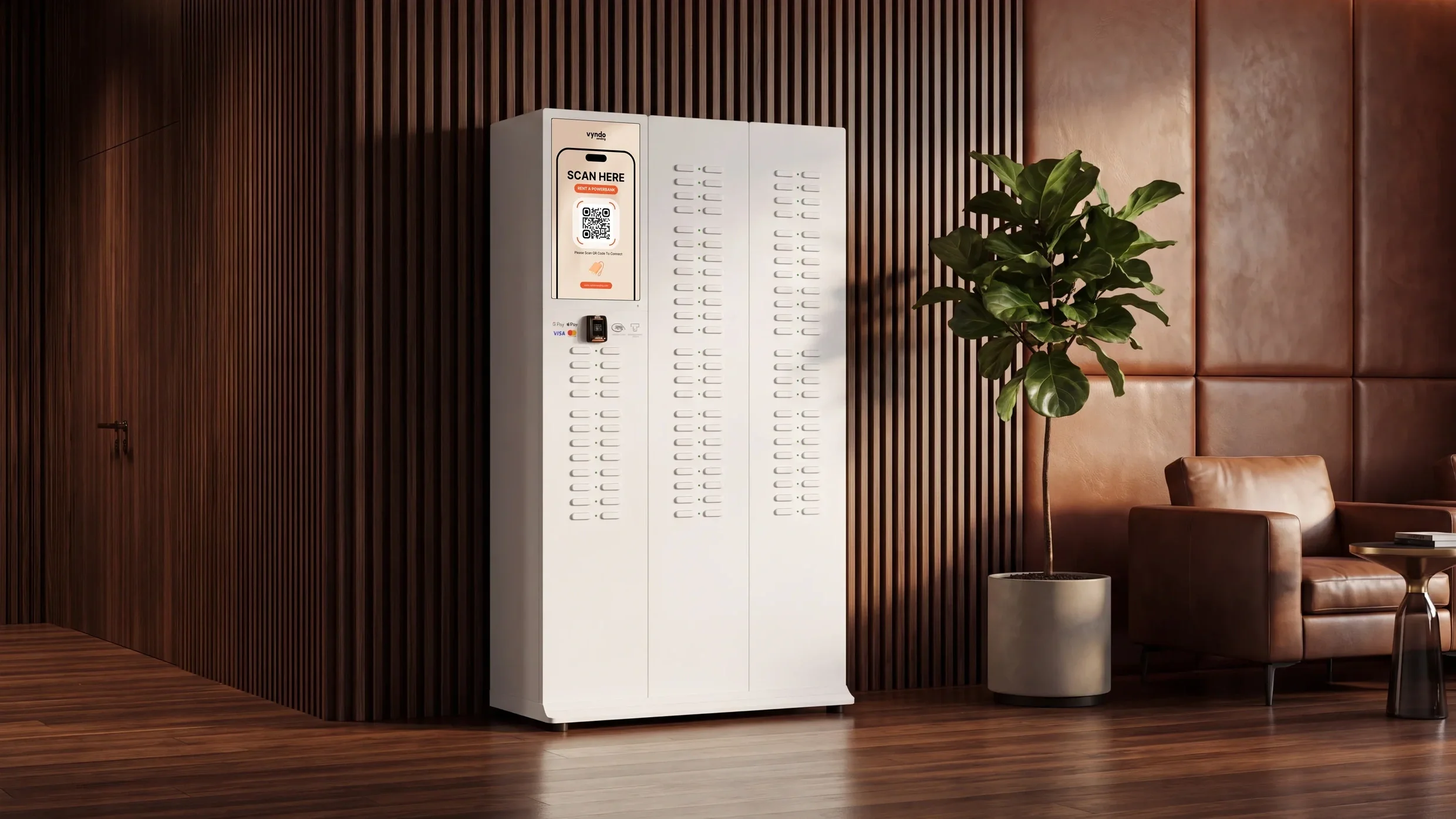 Weißer Powerbank-Verleihautomat mit Display in einer Lounge mit Holzvertäfelung und Pflanze